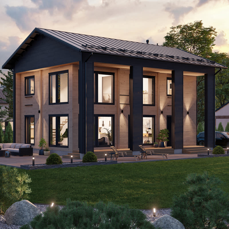 Moderni kaksikerroksinen hirsitalo tummilla ikkunoilla ja valaistulla nurmikolla iltahämärässä