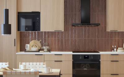 Kuvassa vaalean Cello-keittiö ja musta Cellon liesituuletin.