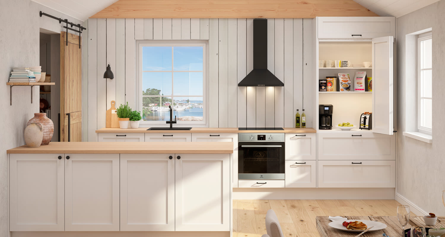 Cello-keittiöiden aamiaiskaapissa on kätevä säilyttää kahvinkeitin ja muut aamiaistarvikkeet. Kuvan keittiössä Vappula-ovimalli.