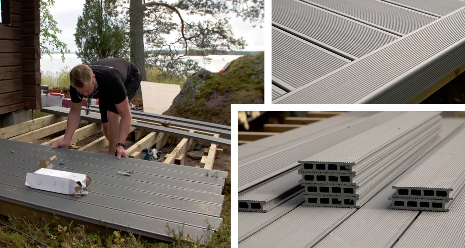 Rakentaja asentaa harmaita komposiittilautoja mökin terassille järvimaisemassa.