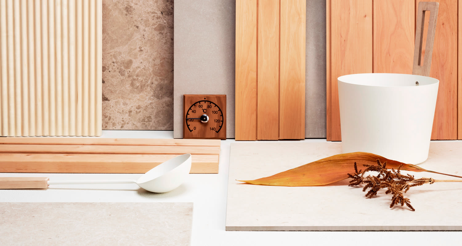 Kuvassa vaaleita pintamateriaaleja saunaan.