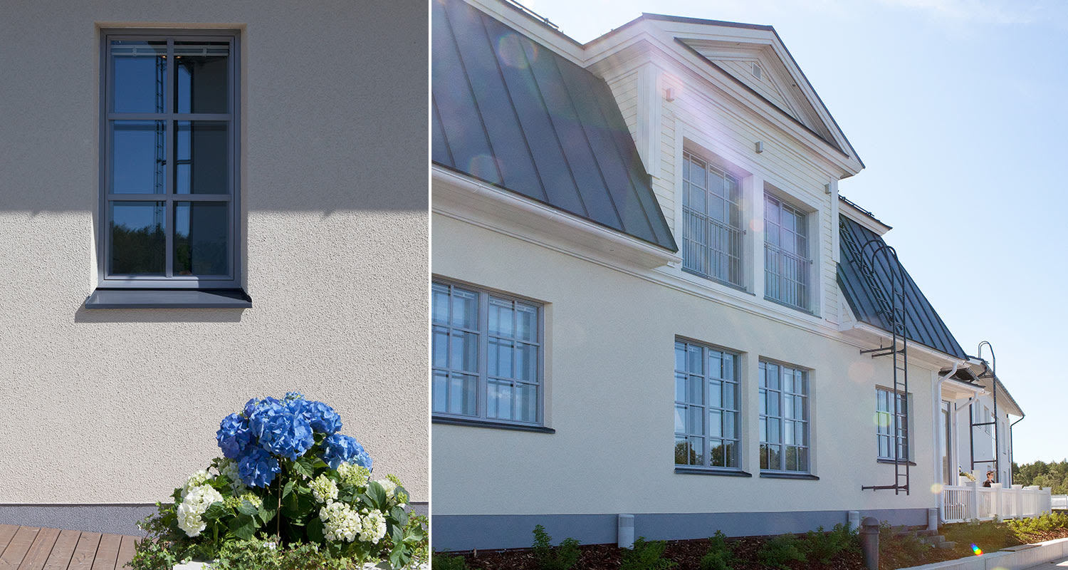 Vaalealla maalilla maalattu kivitalo