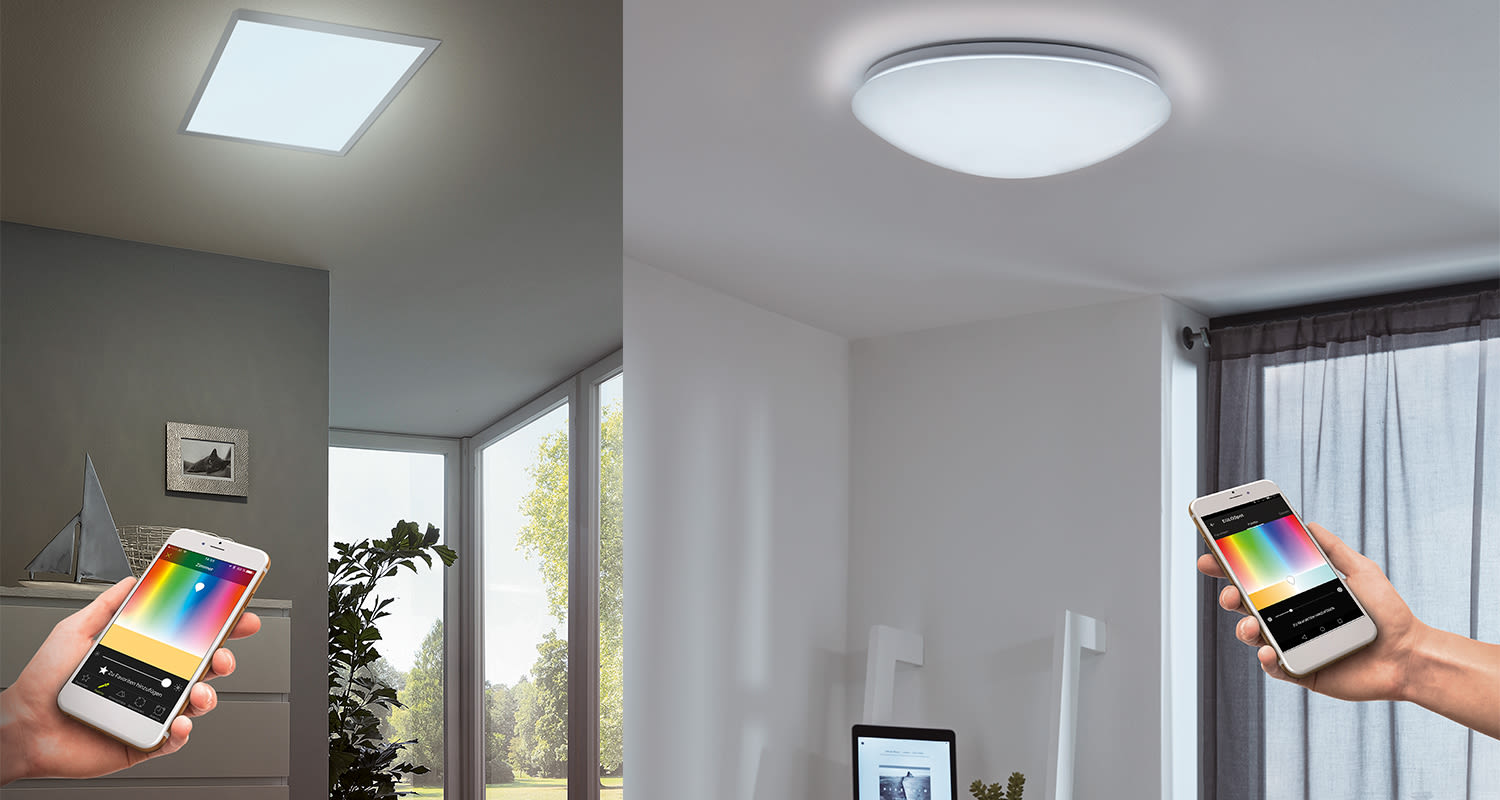 Kädet pitelevät älypuhelimia väripaletilla LED-kattovalaisinten värin ja kirkkauden säätöön