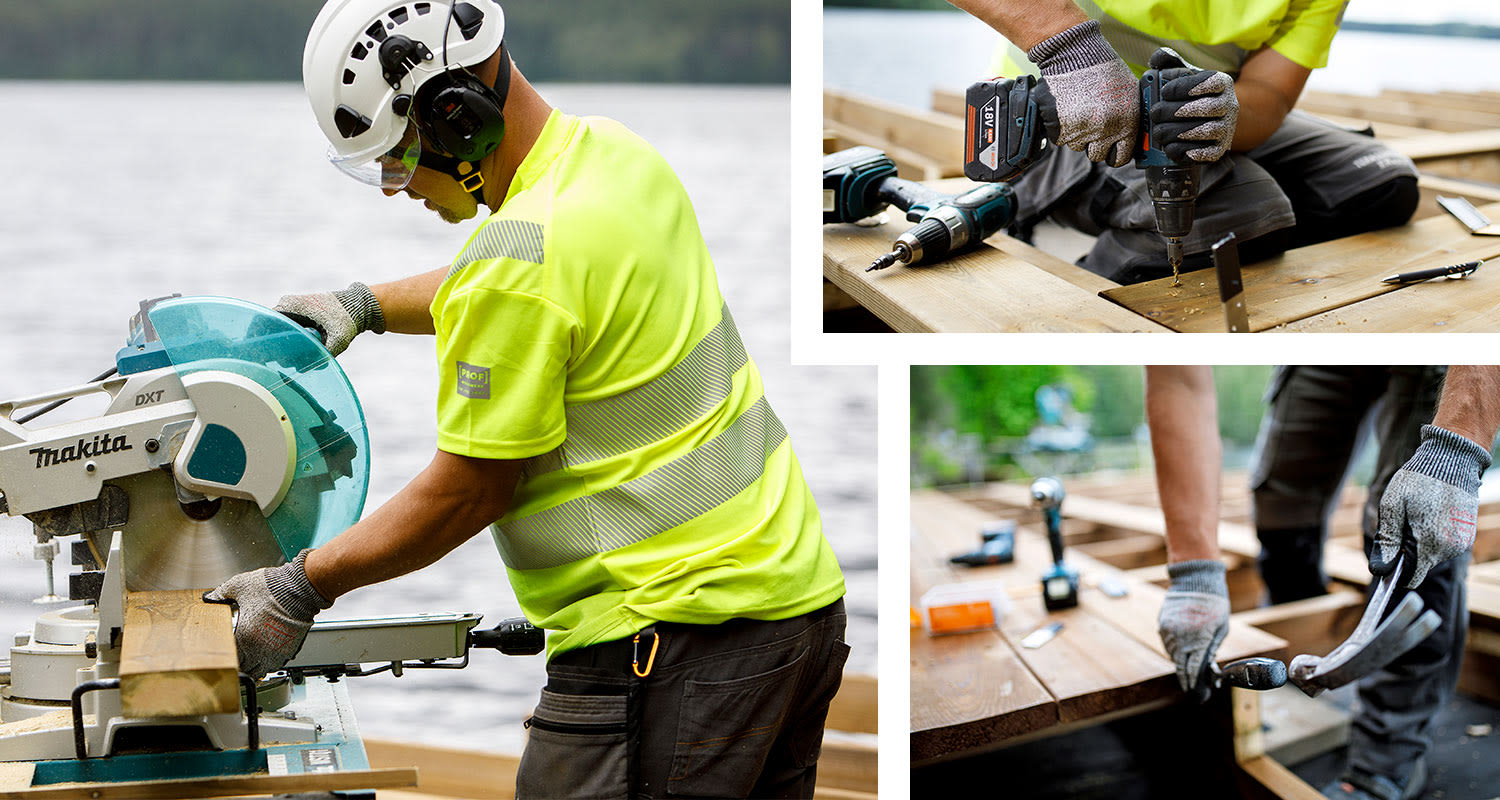 Keltapaitainen rakentaja sahaamassa, poraamassa ja irrottamassa nauloja puulaudalta järven rannalla