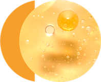 Bubbles floating in clear yellow liquid.