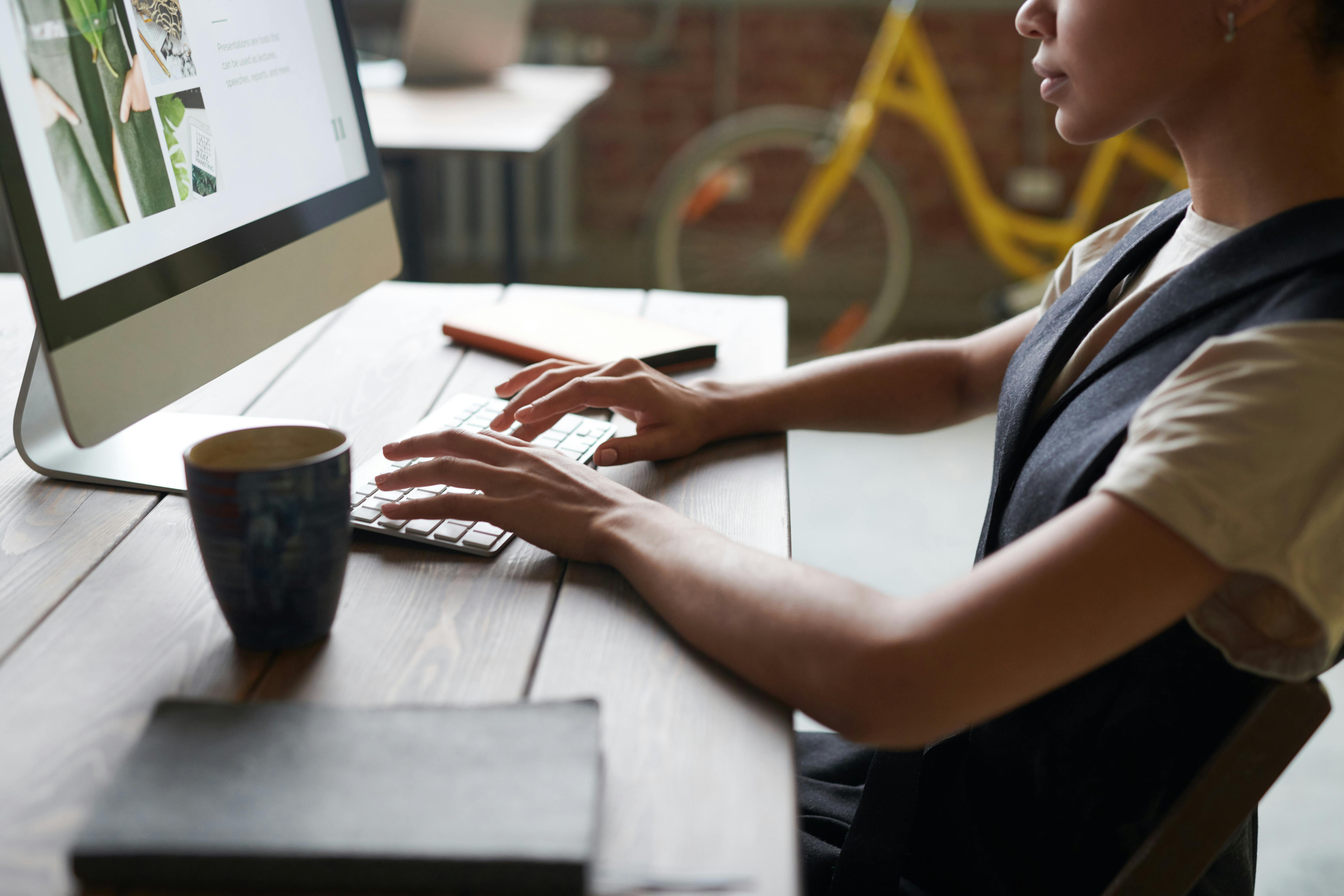 Free Photo Of Person Using Computer Stock Photo
