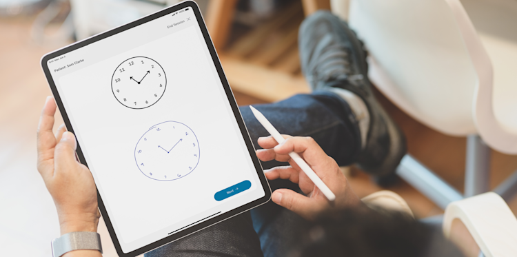 Patient completes the DCTclock assessment with a digital tablet