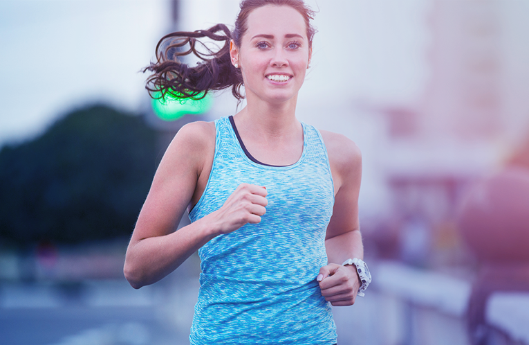 Woman with blue tank top running