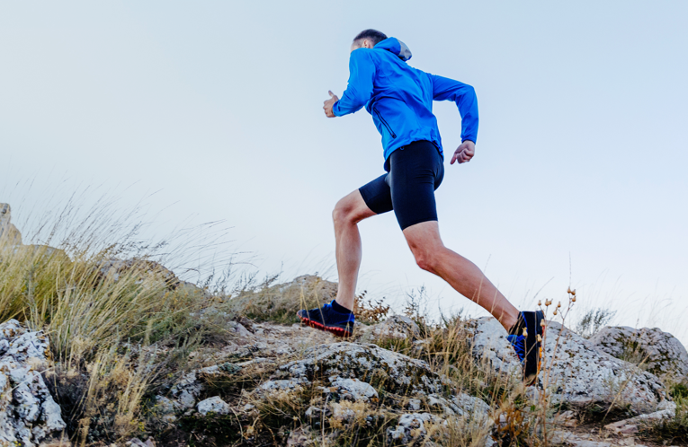 Runner running up a hill