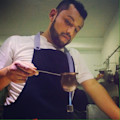 Chef Adrian Barajas de Milpa restaurant preparando un platilo
