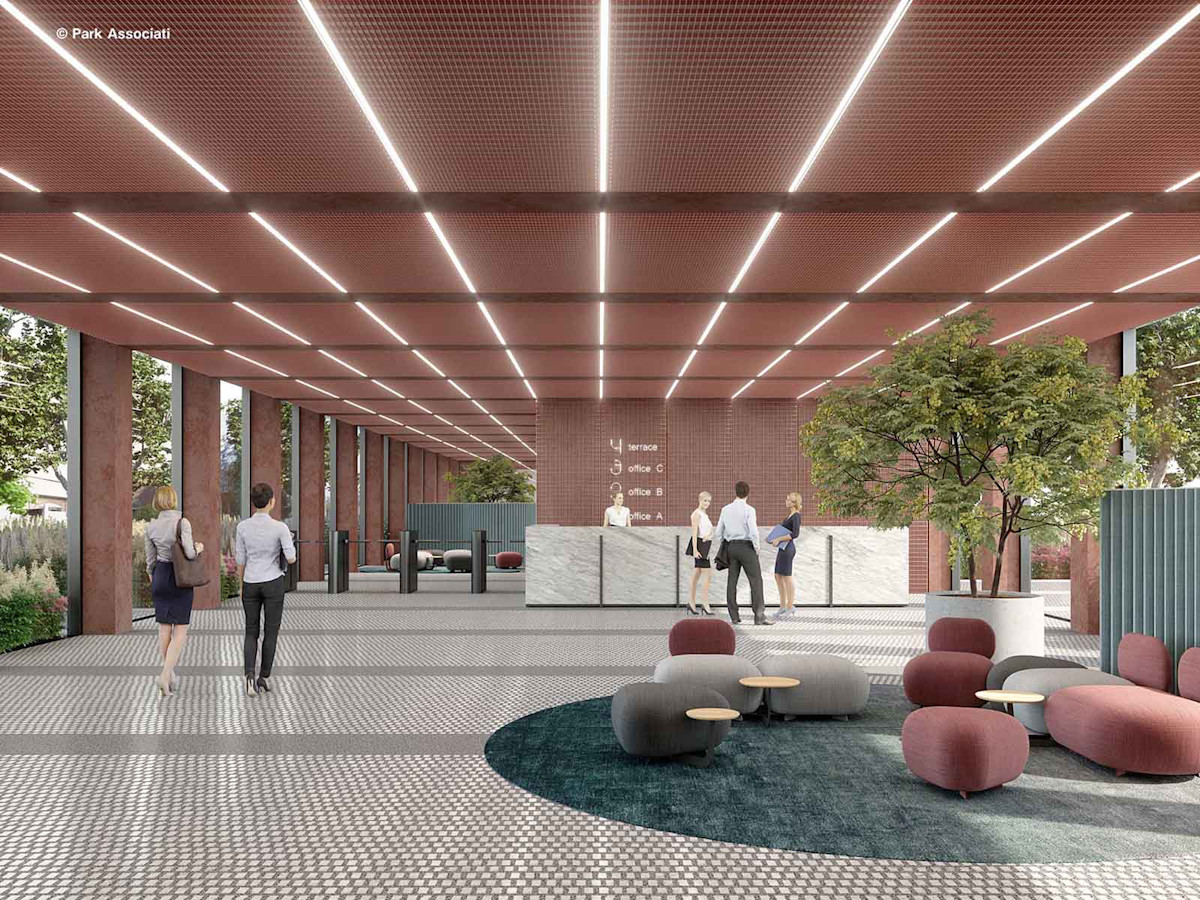 Hall d'ingresso. Ampia e luminosa, si trova nello spazio porticato che collega i due lati lunghi dell’edificio.