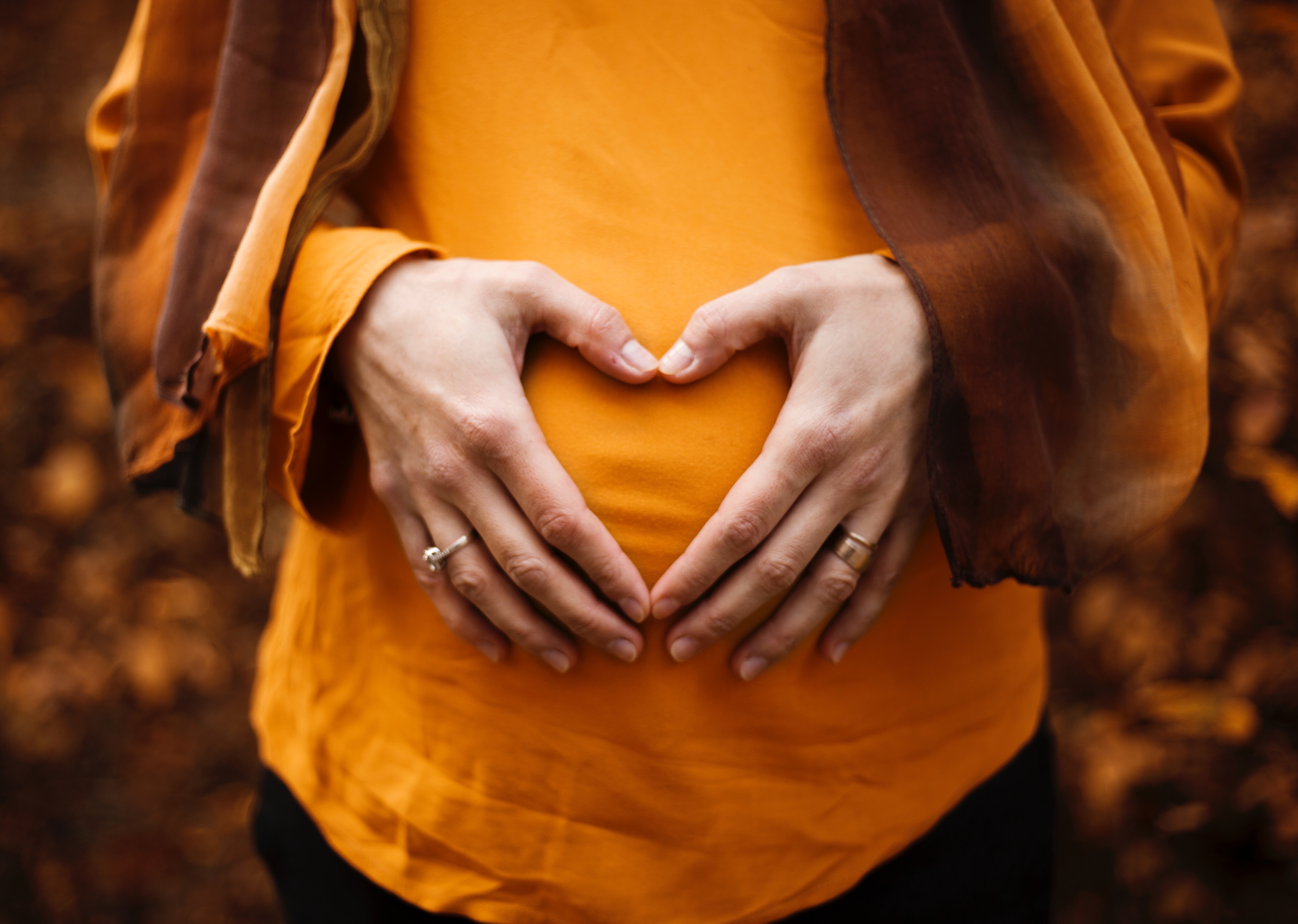 Hands on pregnant belly