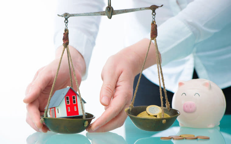 Auf der Waage: Wie viel ist Ihre Immobilie wert? Immobiliengutachter