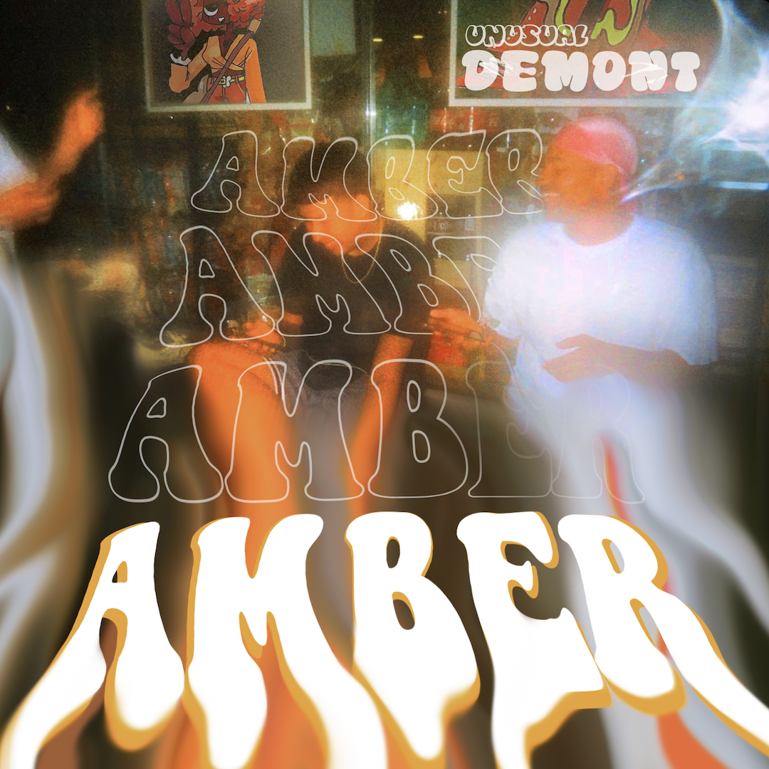 cover art for Unusual Demont's debut single, Amber