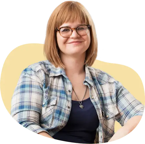 Invitae Labcorp young female patient with red hair and glasses