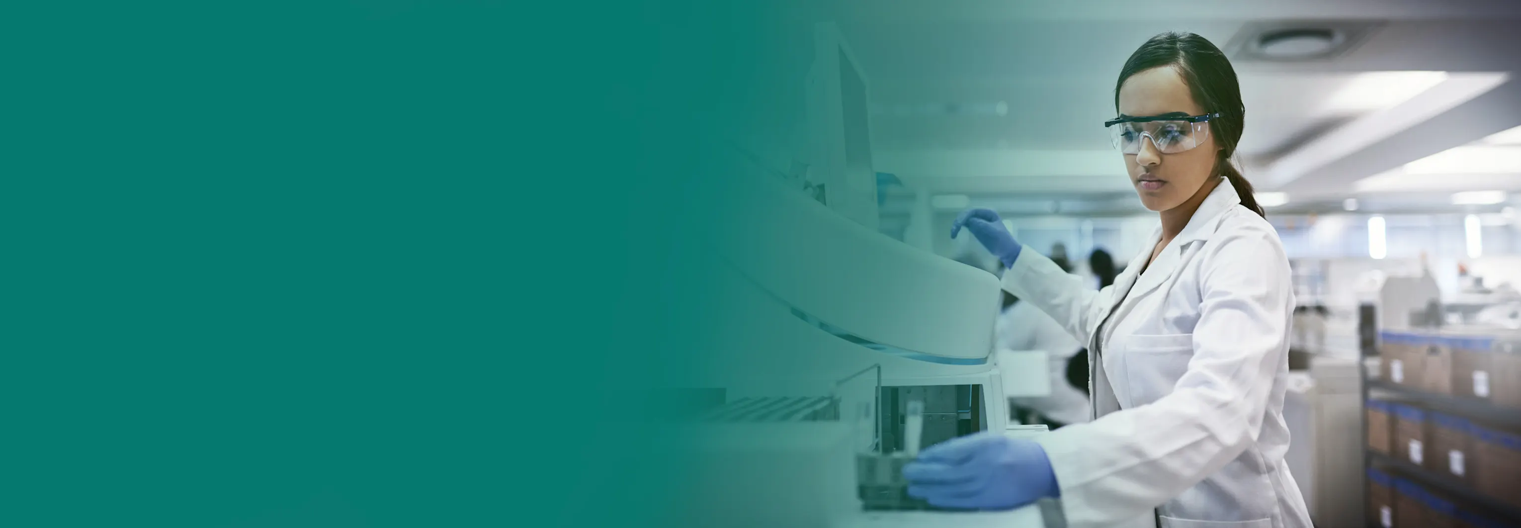 Clinician operating laboratory equipment - Invitae Generation genetic variant classification