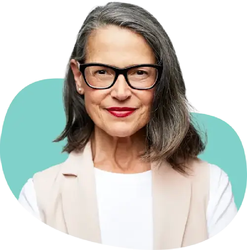 Older white woman patient with glasses and a white shirt