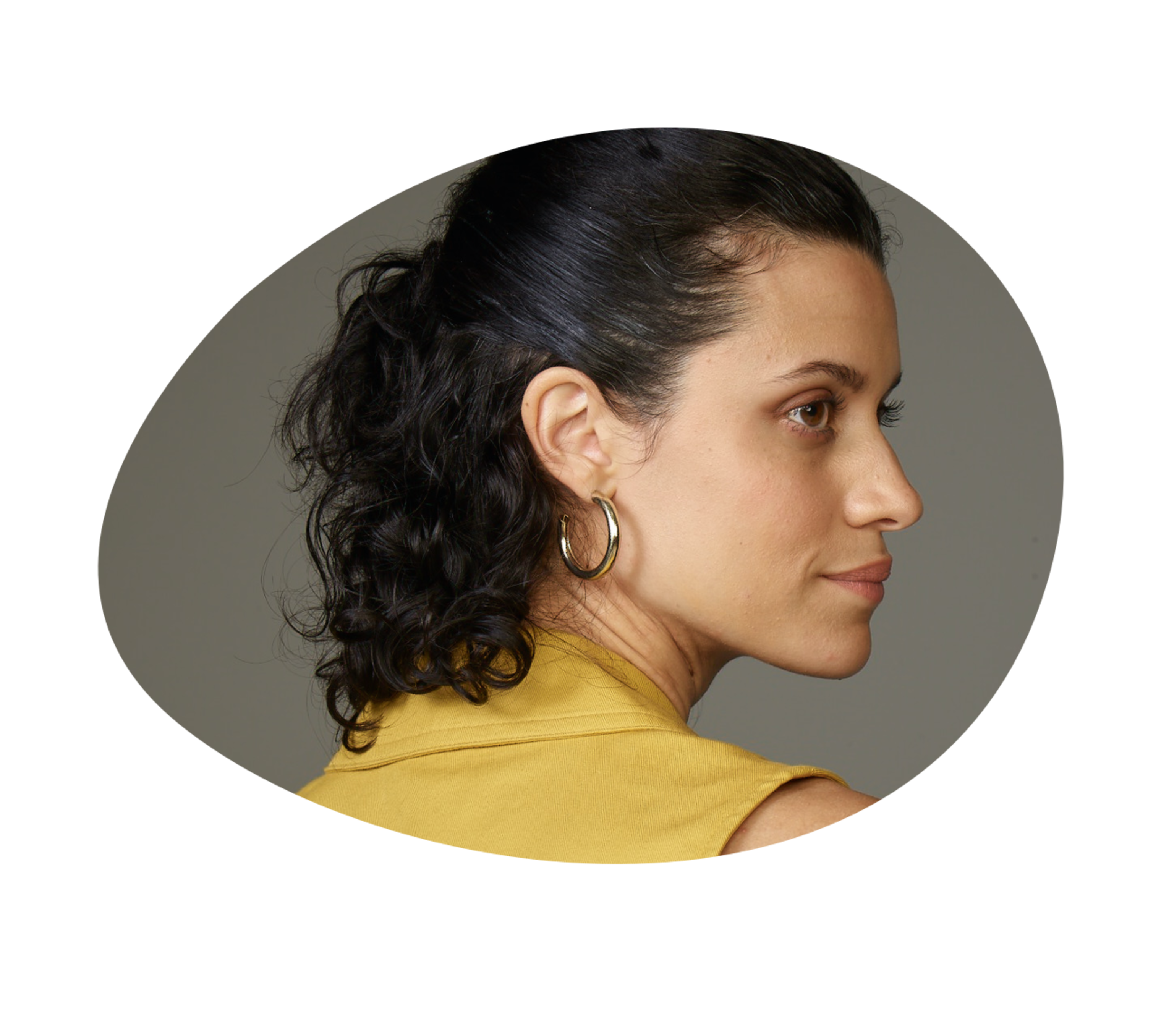 Middle aged dark haired yellow shirt female back profile in circular shape