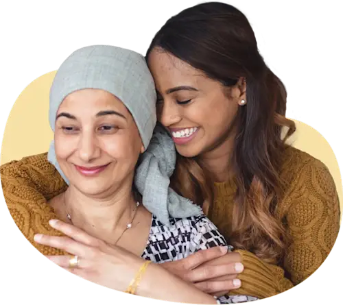 Invitae Labcorp two women cancer patients embraced and happy