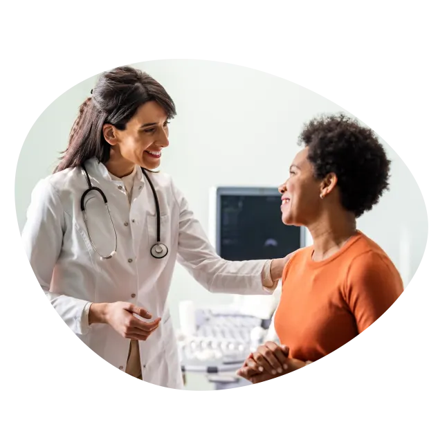 A medical professional consulting with a patient - Invitae Generation