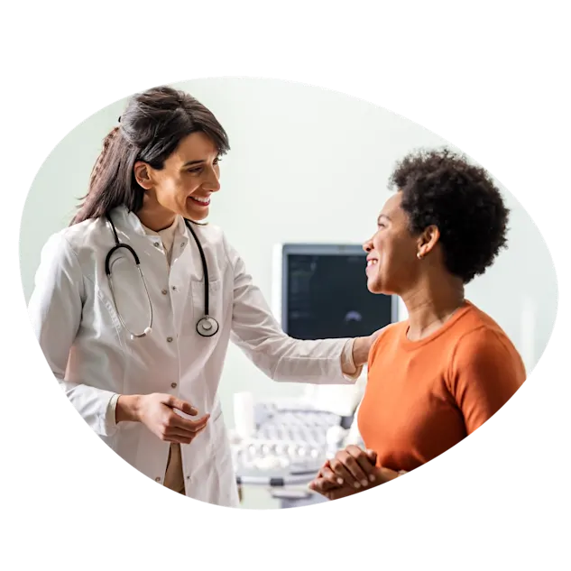 A medical professional consulting with a patient - Invitae Generation