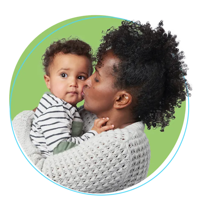 Female holding child patient – Invitae genetic testing