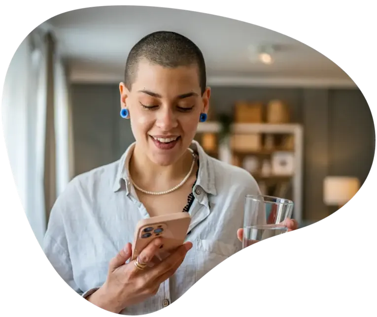 Invitae Labcorp woman patient on mobile device at home