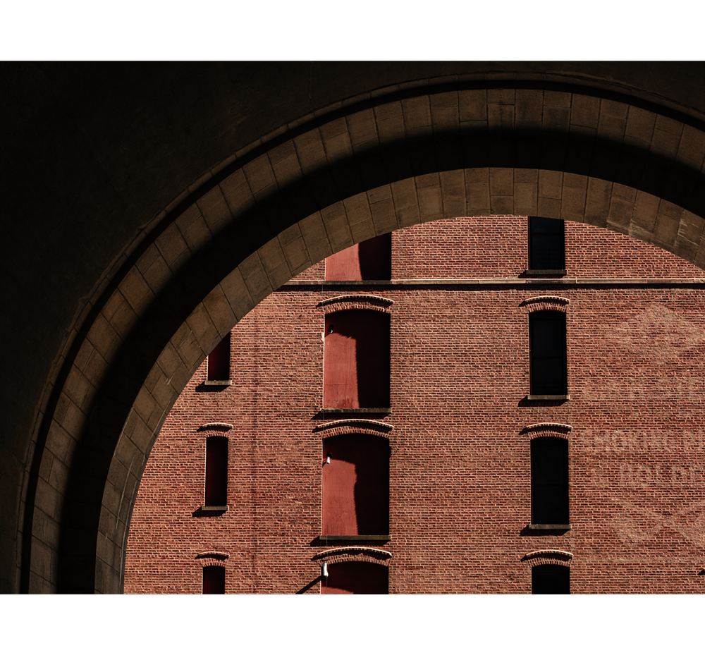 Anchorage Place framed by the Archway.