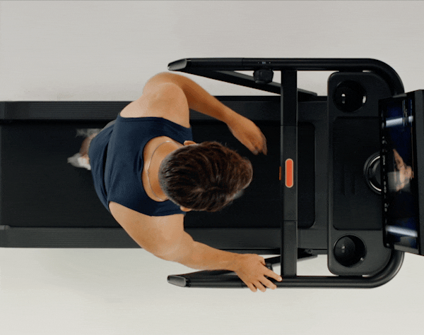 person running on a black treadmill with an overlay saying they are ready for a new challenge and asking if they'd like to increase their pace