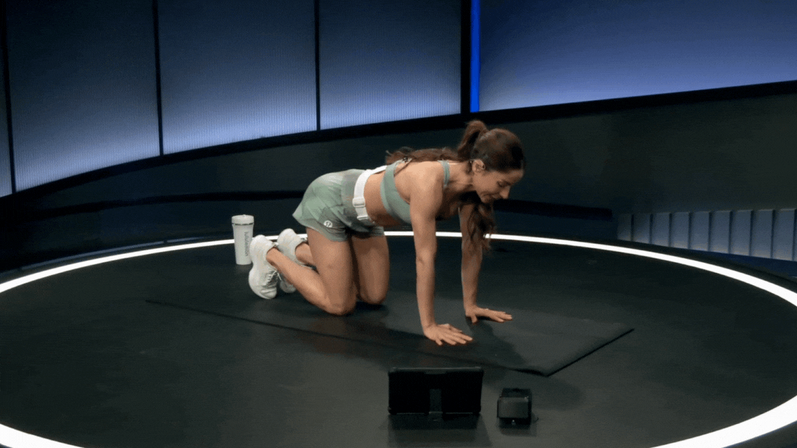 Peloton instructor Assal Arian demonstrates cat cow as an ab exercises you can do every day.