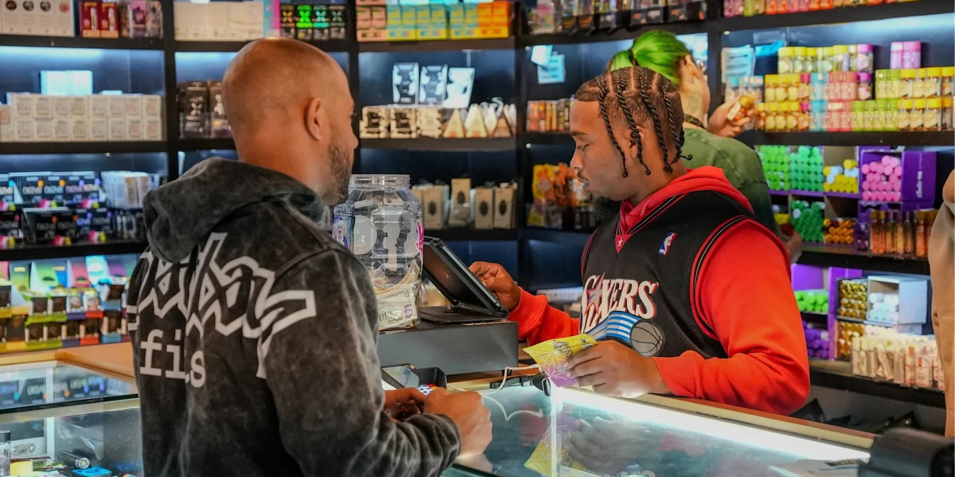 Budtender Completing a Transaction on Meadow POS
