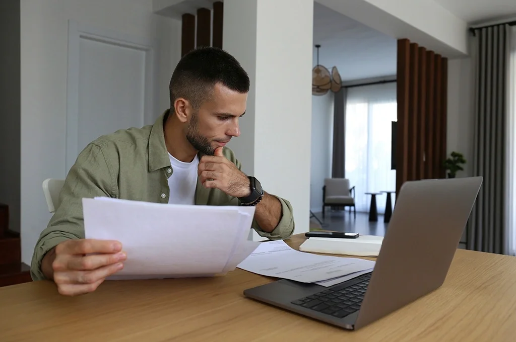 Man reviewing his loan options.