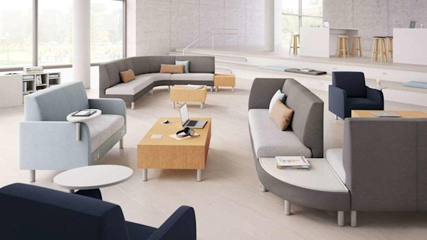 Modern office with sustainable furniture and neutral colors.