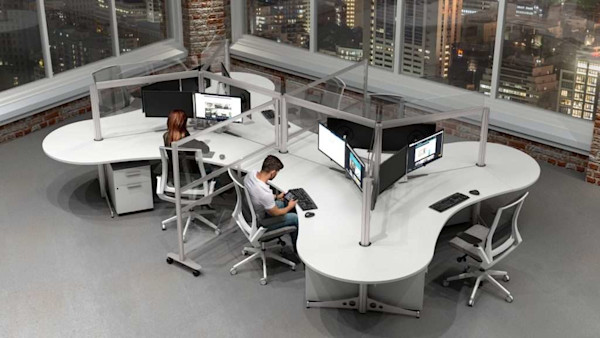curved modular workstation cubicle with clear partitions in an open office with natural light