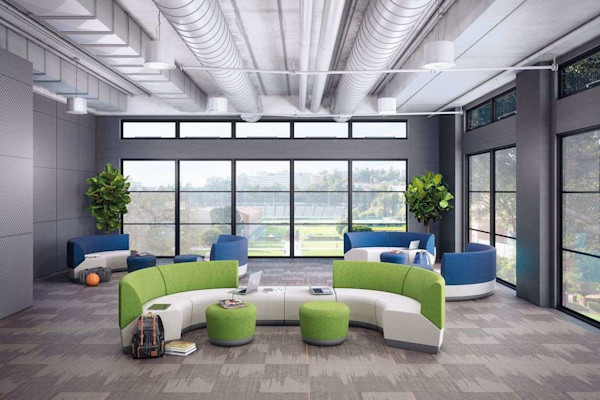 Bright and colorful office space with collaboration furniture and occasional tables.