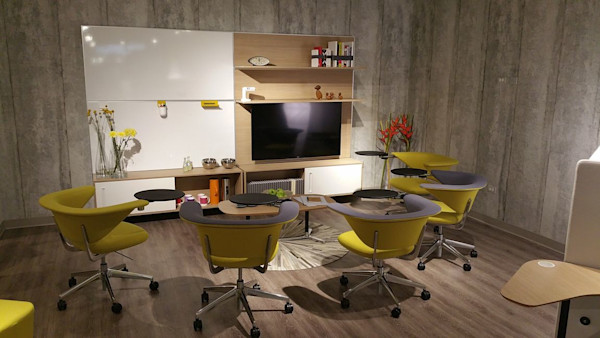 modern flexible office space with ergonomic seating and technology integrated furniture
