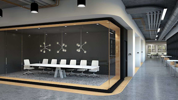 Long white conference table in an acoustic office pod and ergonomic office task chairs