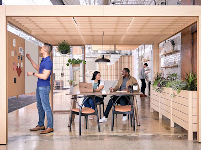team working in a hybrid workplace model