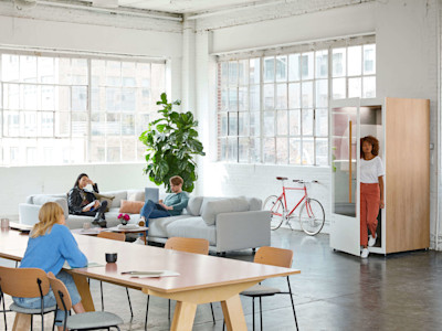 Big office interior with natural light and pod