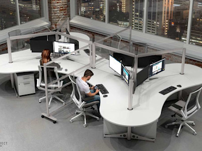 Two coworkers sharing space safely at Post-COVID cubicle