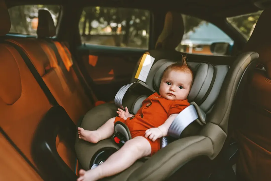 SI | Niños en silla de auto