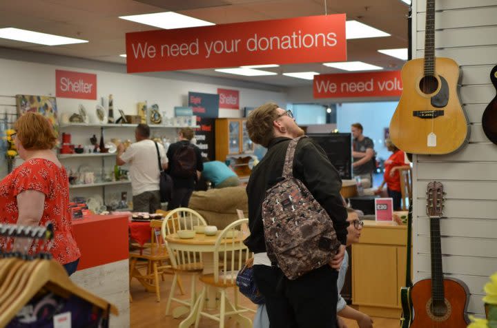 People browsing in a Shelter furniture shop