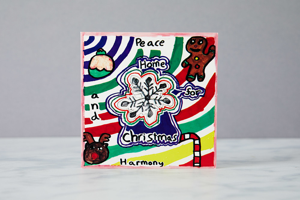 Colourful and festive 'Home for Christmas' card designed by school pupil Abbie Russell.