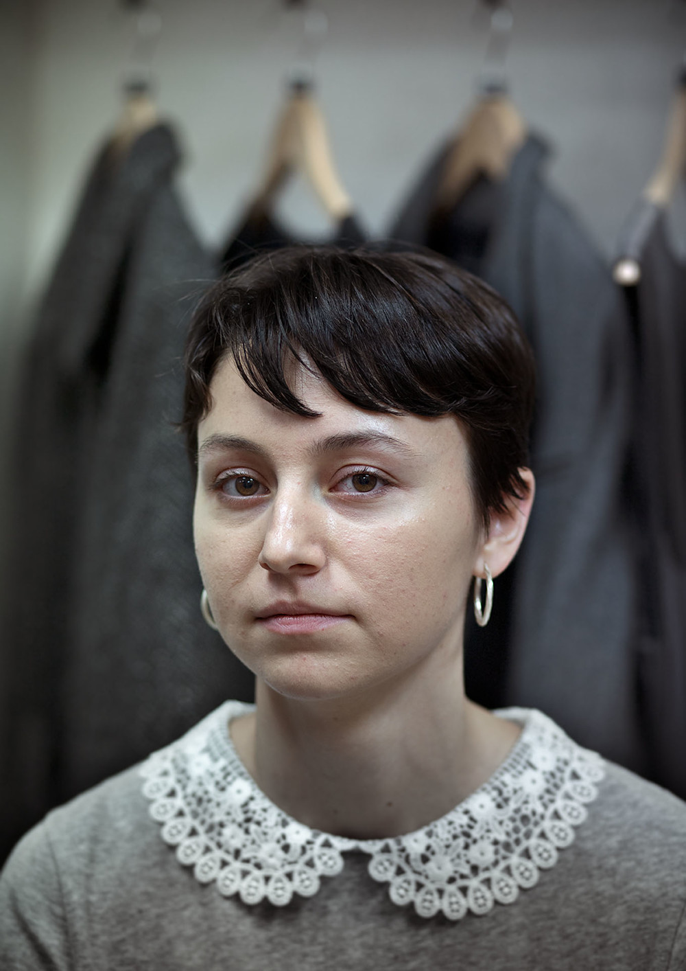 Chloe, a volunteer at a Shelter Scotland shop. Photographed for Shelter Scotland's 50th anniversary by Melissa Mitchell.