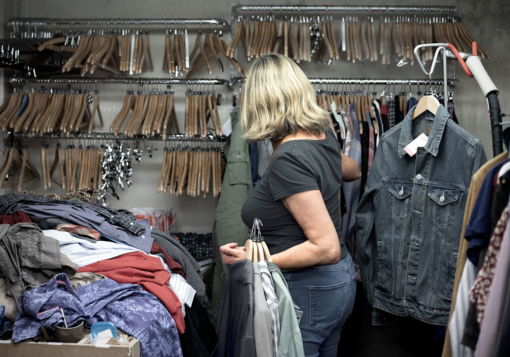 Jackie, a volunteer at a Shelter Scotland shop. Photographed for Shelter Scotland's 50th anniversary
