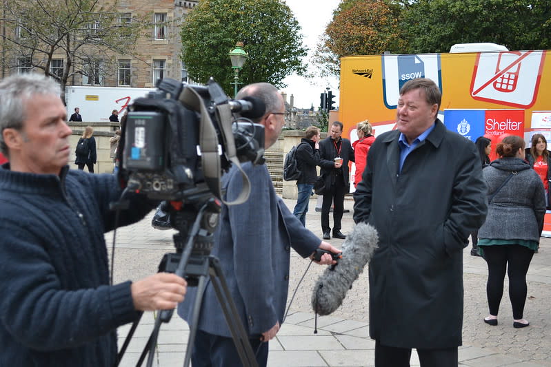 Shelter Scotland Director talking to journalist
