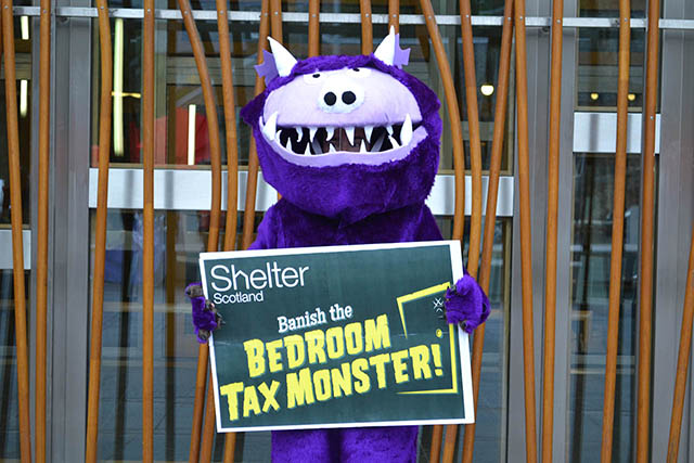 //images.ctfassets.net/6sqqfrl11sfj/5OUmGiGXi33cKHehUSeZnA/4860df5b6fafd57fa51290c484ce9a7b/bedroom-tax-monster.jpg
