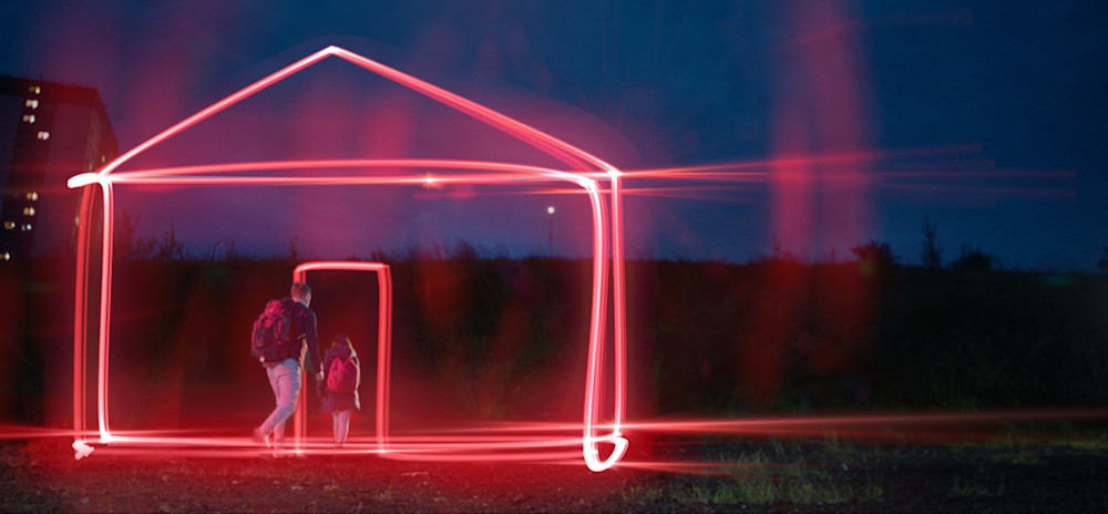 neon lights house - father and daughter going through the doorway