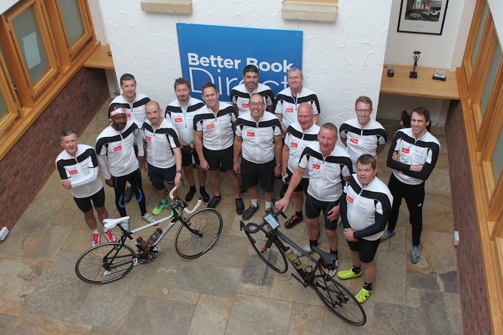 Team of cyclists at Shelter event