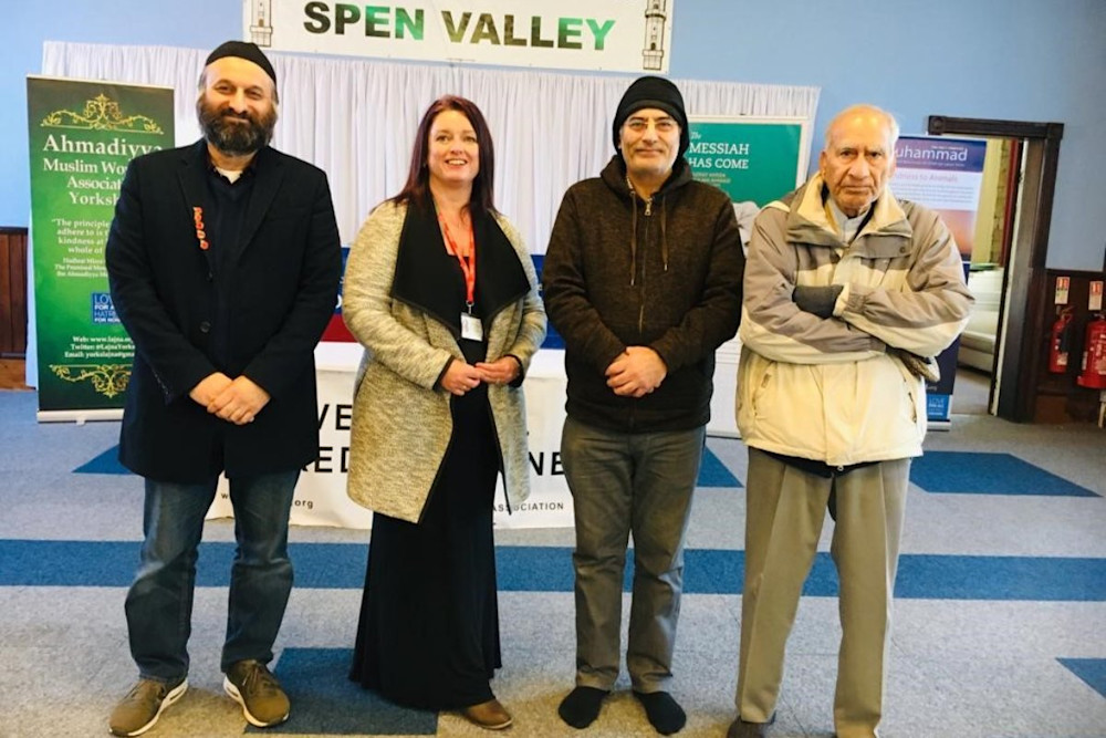 Three men and a woman from the fundraisers at Ahmadiyya Mosque